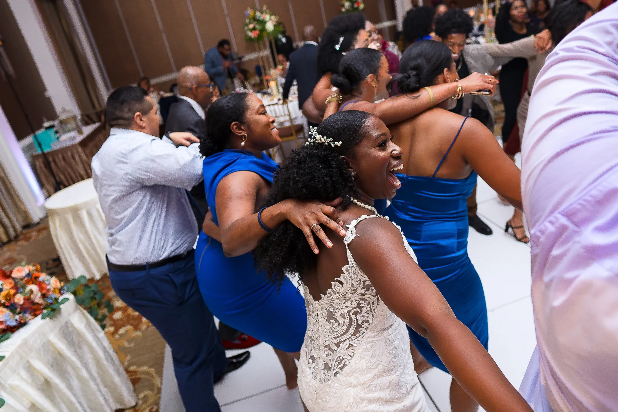 Bride dancing with her friends at the reception
